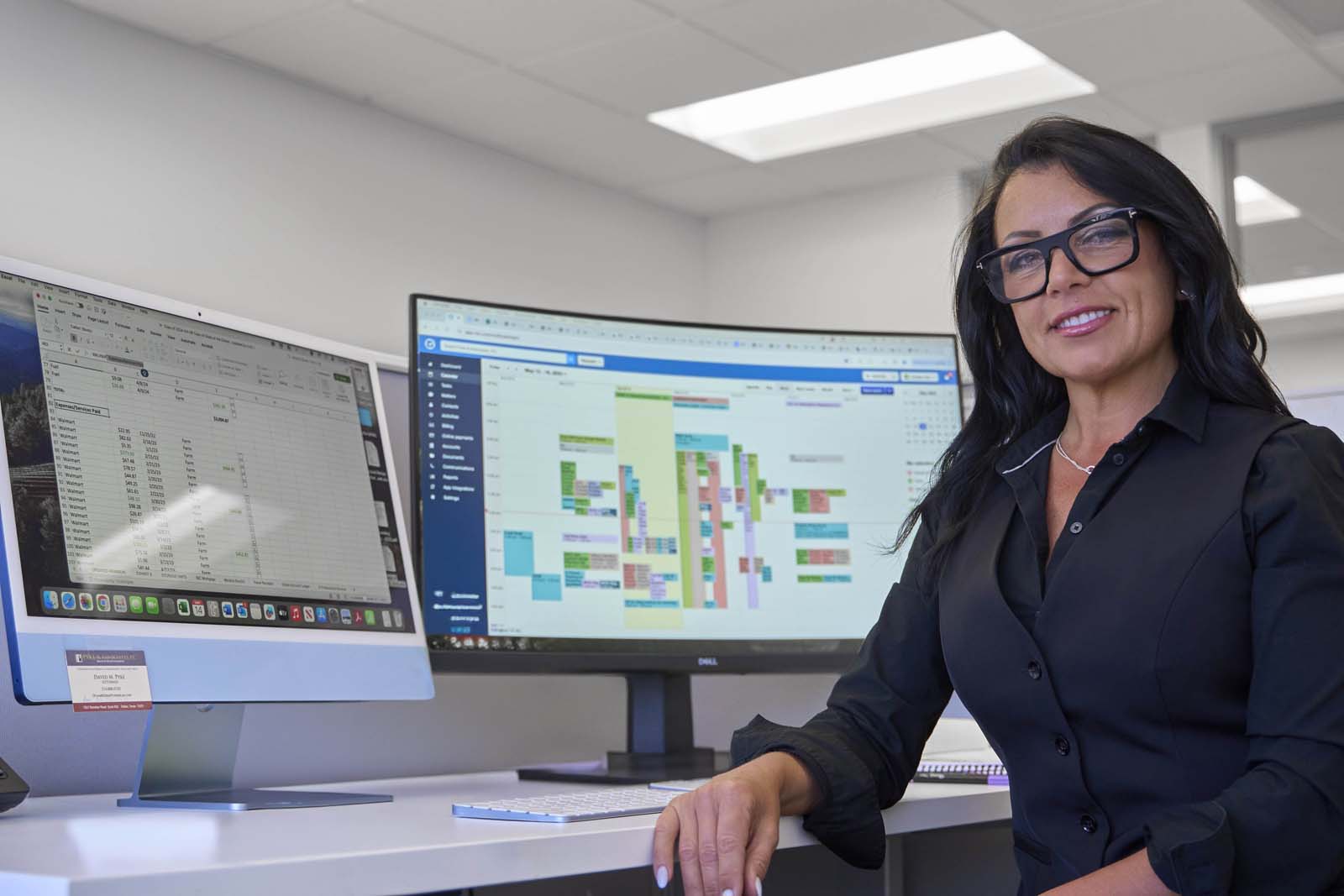 Businesswoman at desk office NYC corporate photography