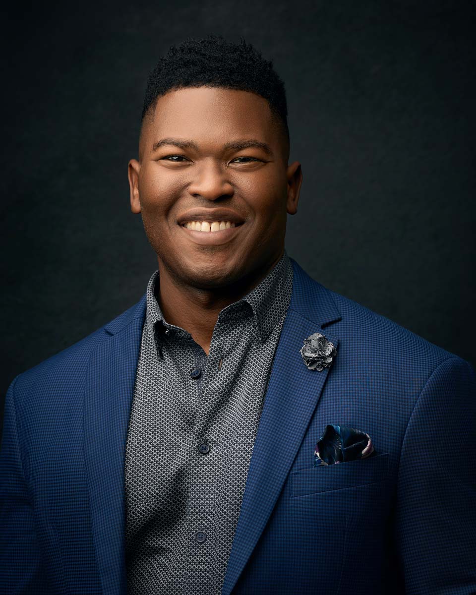 Man blue suit professional headshot NYC