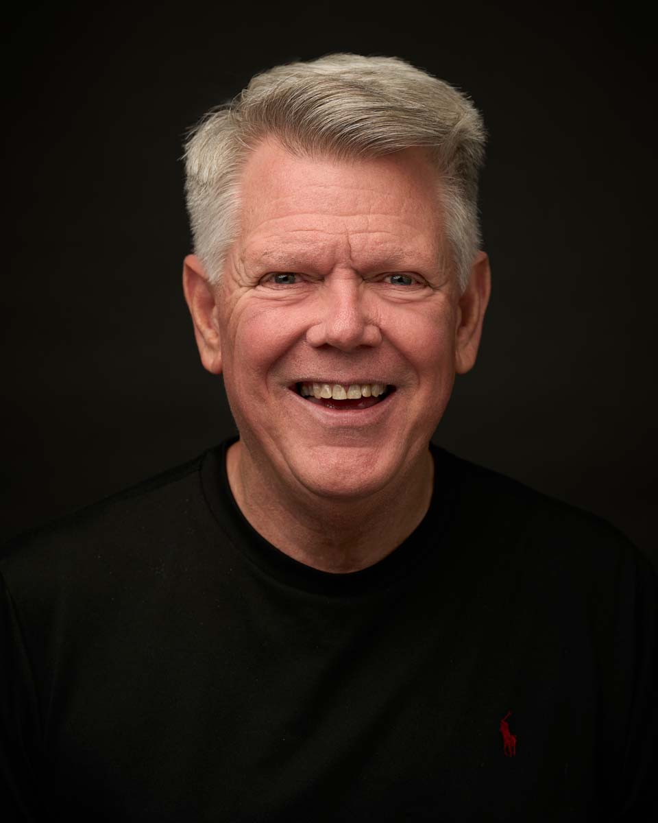 Senior man smiling energetic lifestyle headshot NYC