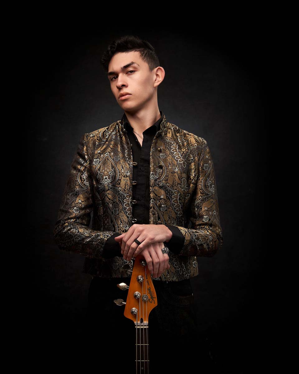 Young man bass guitar musician portrait NYC branding