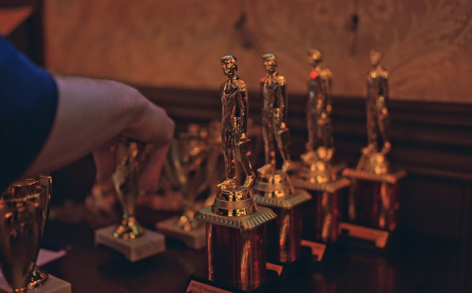 NYC corporate awards ceremony trophy display event photography detail