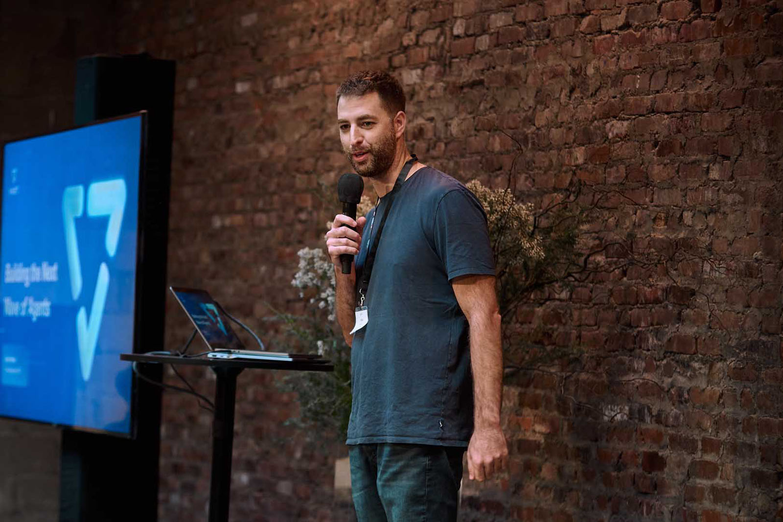 NYC tech conference keynote speaker on stage event photography